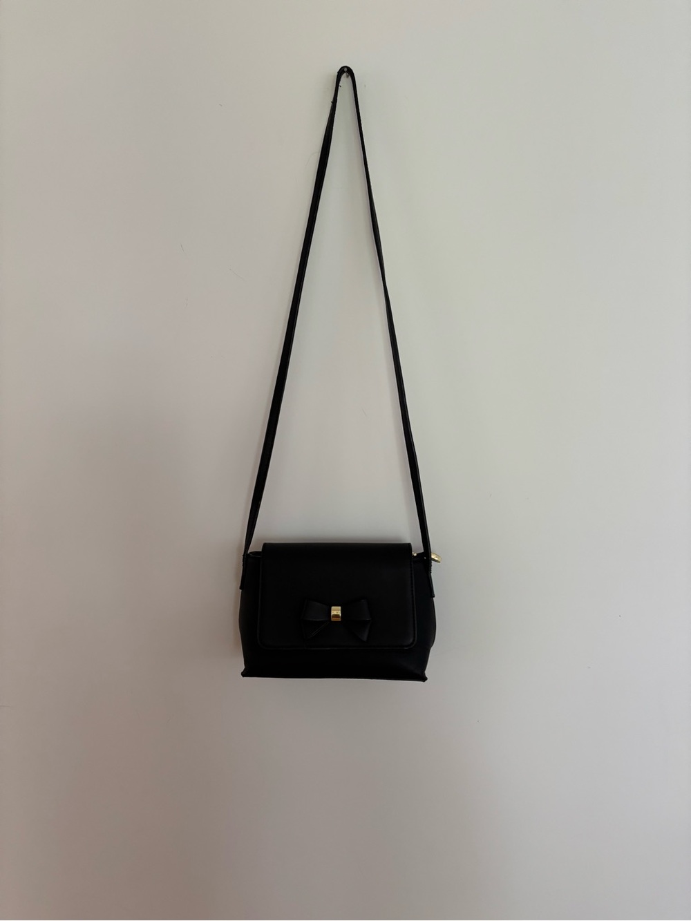 Elegant Black Bow Crossbody with Gold Accent